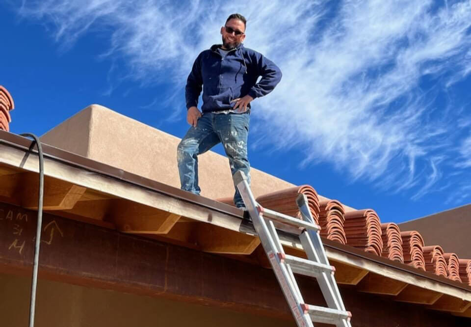 Sunrise Roofers LLC team working on a roof in Tucson
